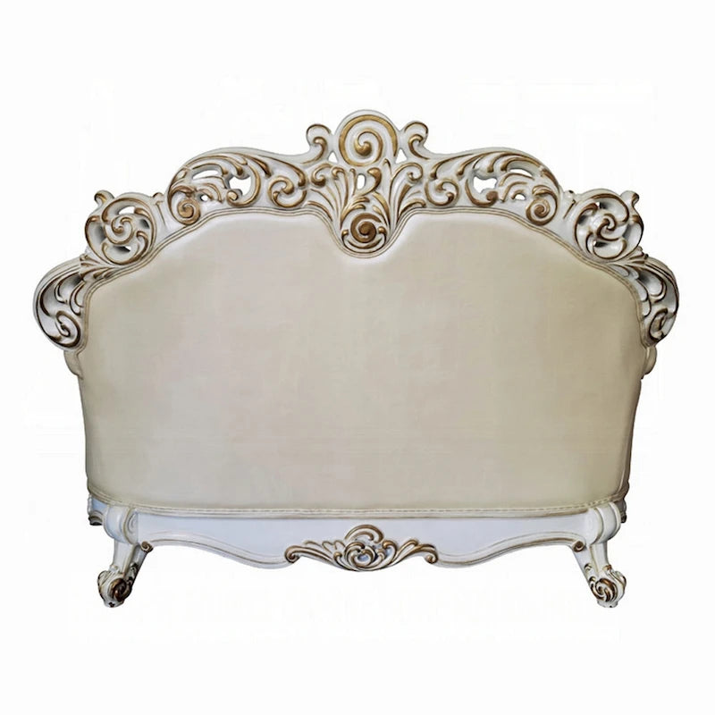 Causeuse blanc perle en similicuir sculpté couleur champagne avec clous décoratifs 70 po