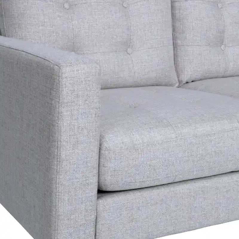 Canapé contemporain 3 places en tissu capitonné avec accoudoirs droits et boutonnage