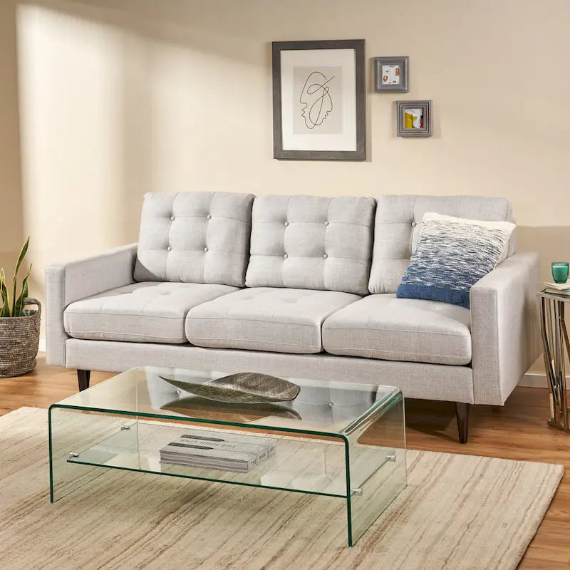 Canapé contemporain 3 places en tissu capitonné avec accoudoirs droits et boutonnage