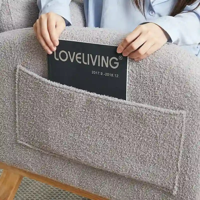 Fauteuil à bascule rembourré à dossier haut de style moderne avec poches latérales